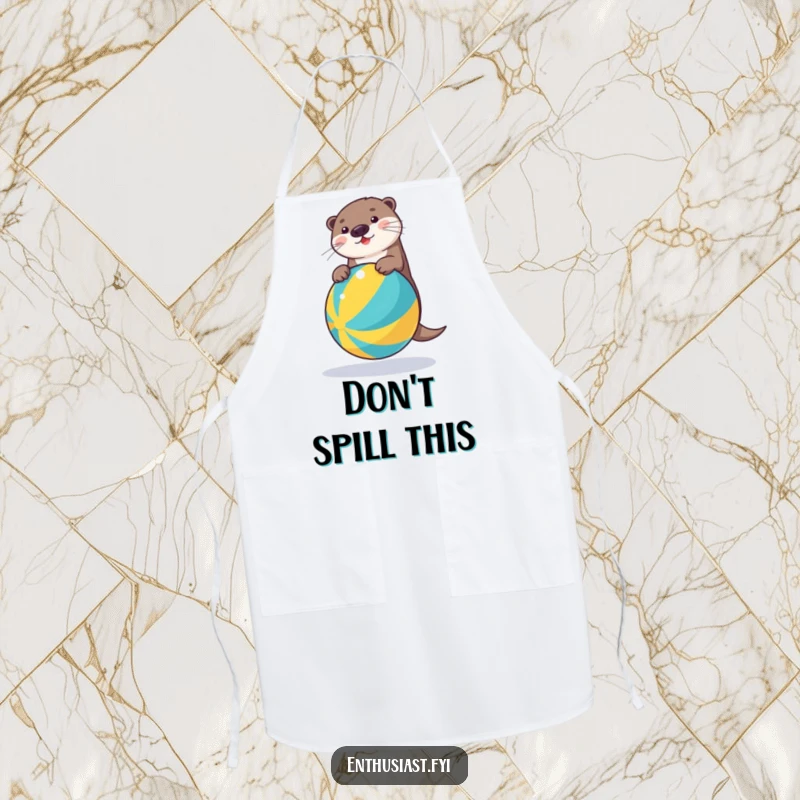 Funny apron featuring a determined otter attempting to balance on a tropical beach ball, ready for kitchen chaos and laughter.