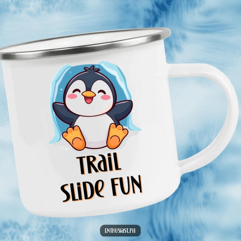 Funny camping mug with a cheerful penguin character sliding down a vibrant rainbow ice chute, ideal for outdoor winter fun.