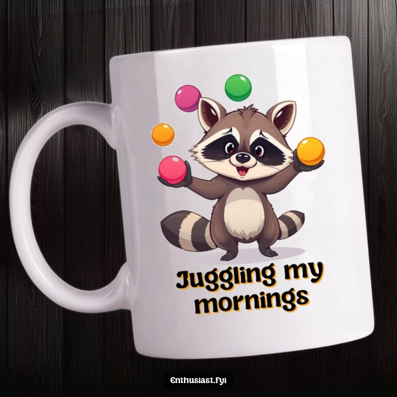 Funny raccoon juggling mug features a goofy raccoon skillfully juggling three brightly colored balls with a mischievous grin.