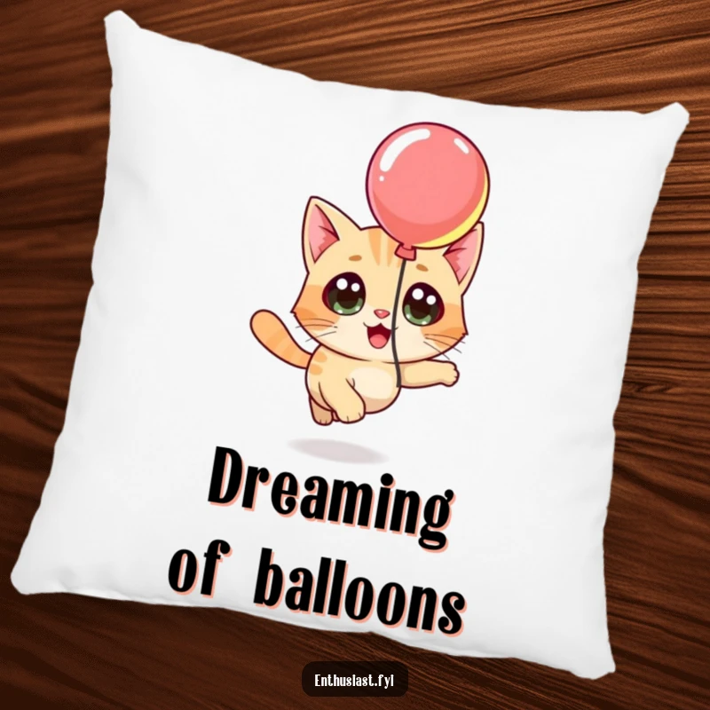 Funny pillow featuring a curious cat character chasing a brightly colored balloon, offering comfort and playful charm.