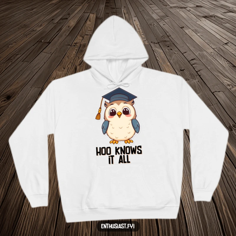 Funny hoodie with a beaming owl wearing a graduation cap, looking up with hopeful excitement, symbolizing achievement and future aspirations.
