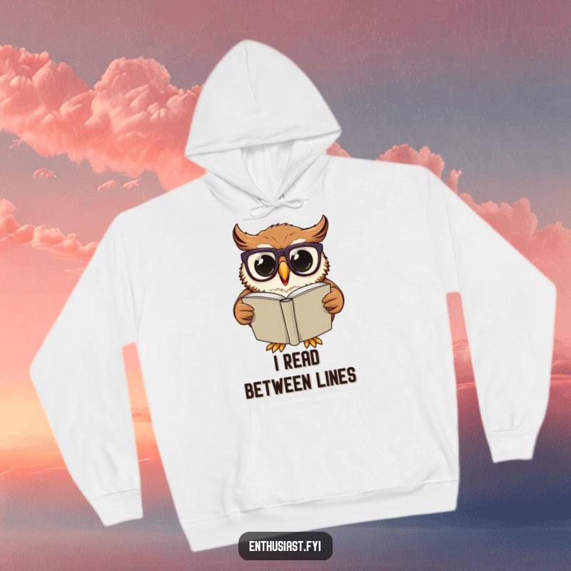 Funny Hoodie: Excited owl wearing oversized glasses, engrossed in reading a large book, designed for comfort and celebrating wisdom.