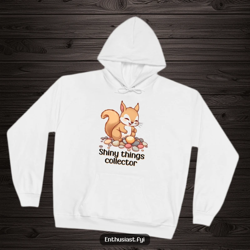 Funny squirrel hoodie, showing a determined squirrel enthusiastically gathering shimmering pebbles. A cozy and humorous apparel gift.