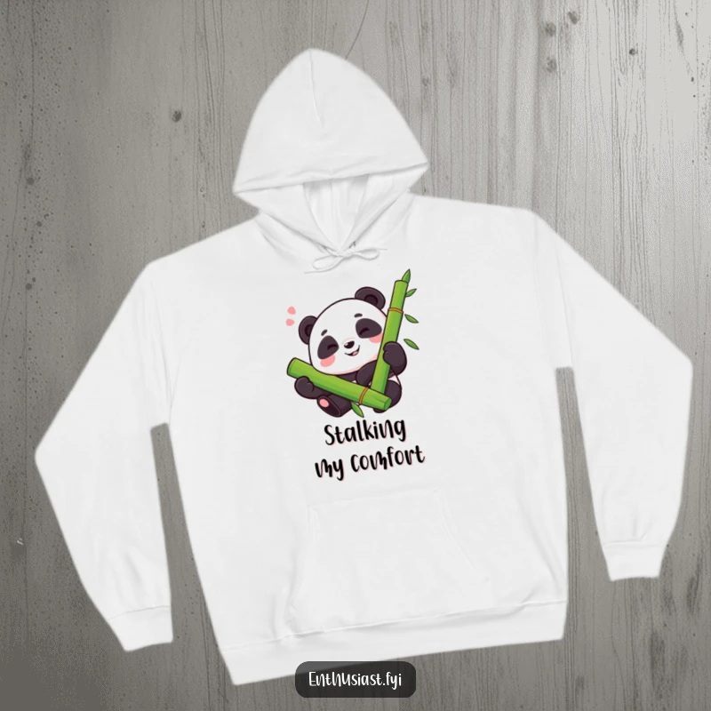 Funny hoodie featuring a proud panda with a happy sigh, enthusiastically hugging a large bamboo stalk, perfect for cozy relaxation.