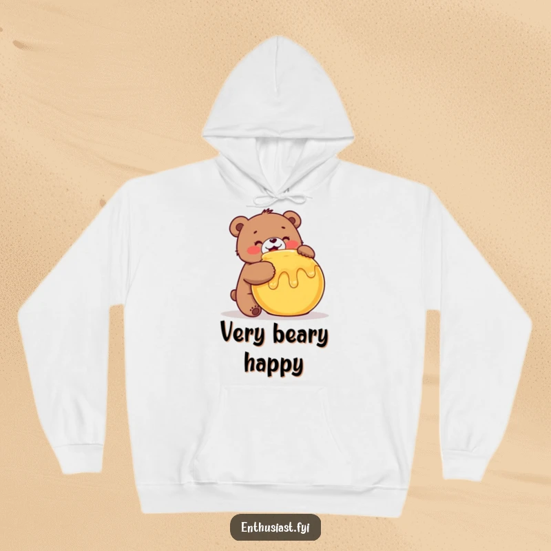 Funny Bear Hoodie: A cheerful bear enthusiastically hugs a honey pot, offering cozy comfort and sweet vibes, a great funny gift.