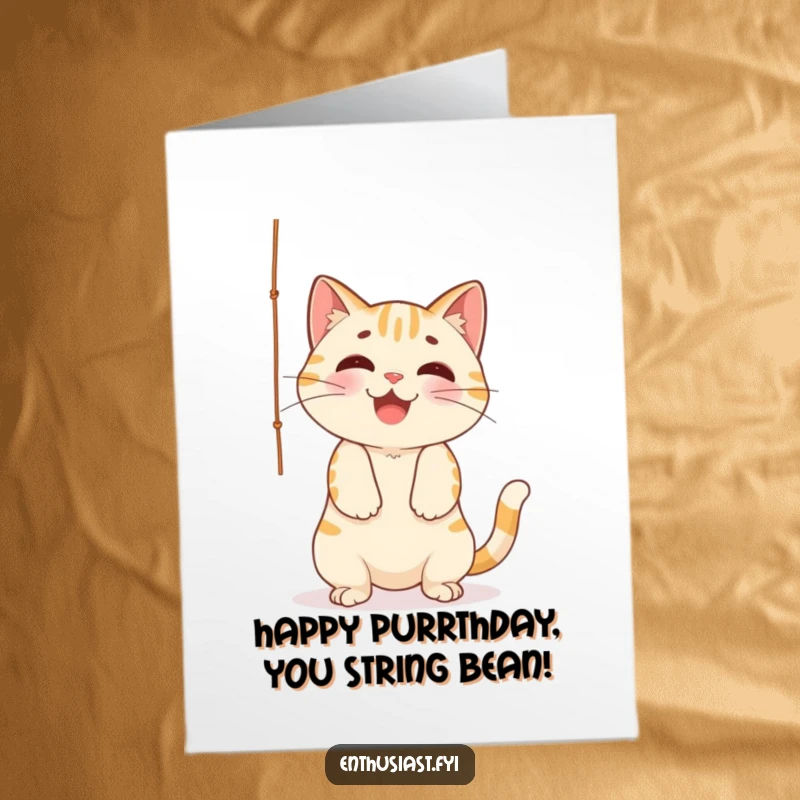 Funny Free Printable Birthday Card: A cheerful cat playfully batting at a dangling string, full of mischievous energy.