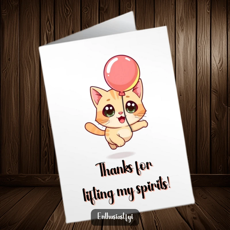 Funny Free Printable Thank You Card of a cat curiously chasing a brightly colored floating balloon.