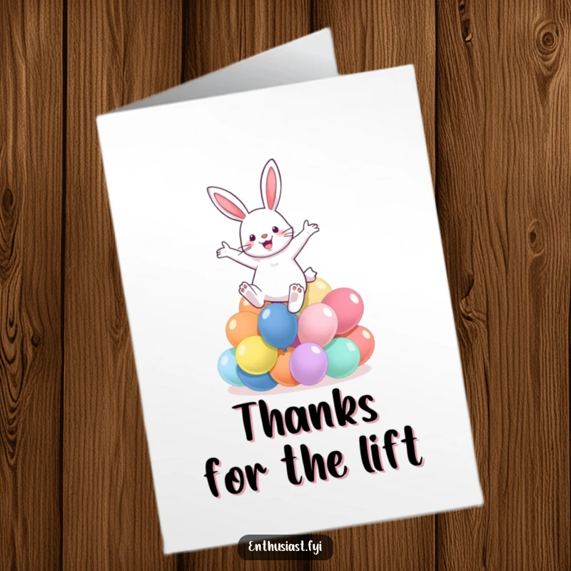 Funny Free Printable Thank You Card: A cheerful rabbit bounds over colorful balloons, conveying thanks with energetic delight.