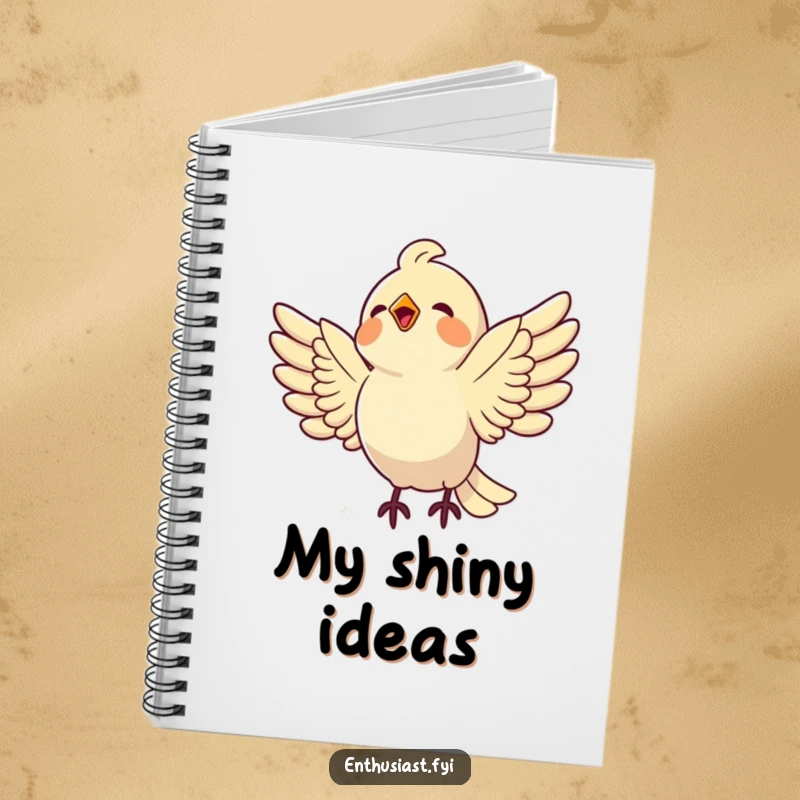 Funny bird notebook showing a delighted bird swooping towards a shiny object, symbolizing capturing great ideas.