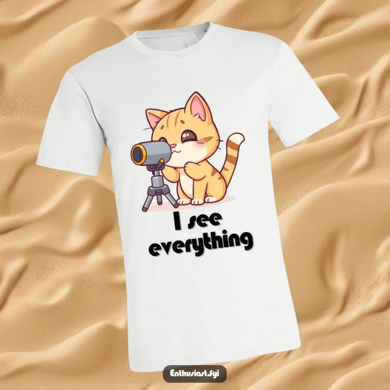 Funny cat t-shirt with a curious character looking through a telescope, perfect for space and cat lovers.