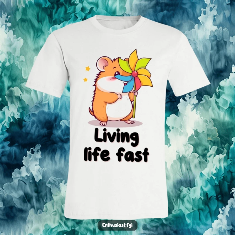 Funny energetic hamster t-shirt depicts a happy hamster mid-spin on a colorful pinwheel, capturing a moment of sheer delight.