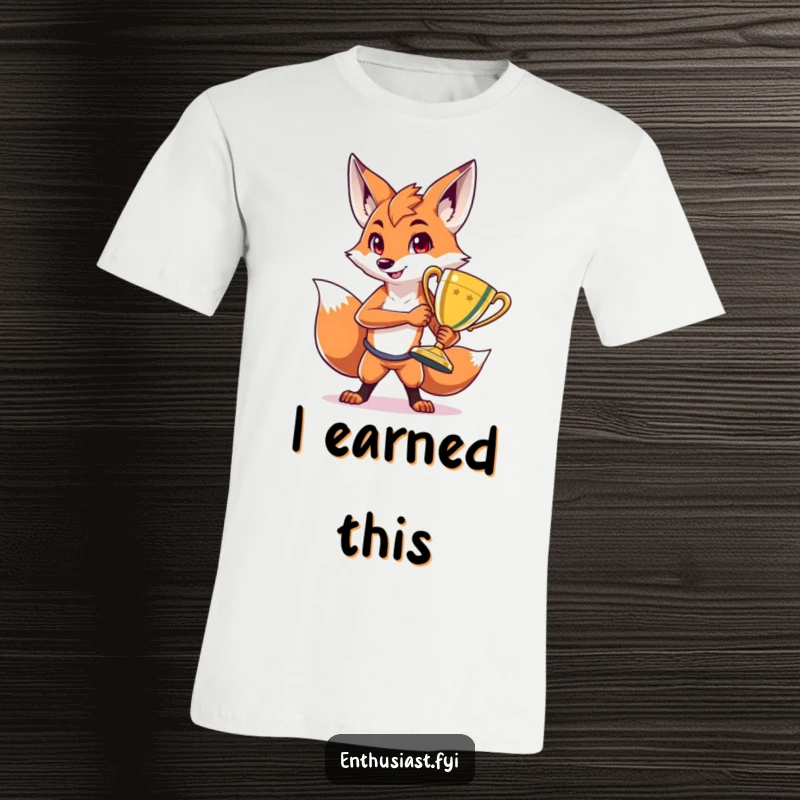 Funny t-shirt showcasing a proud fox character confidently posing with a large, gleaming trophy, embodying success and playful arrogance.