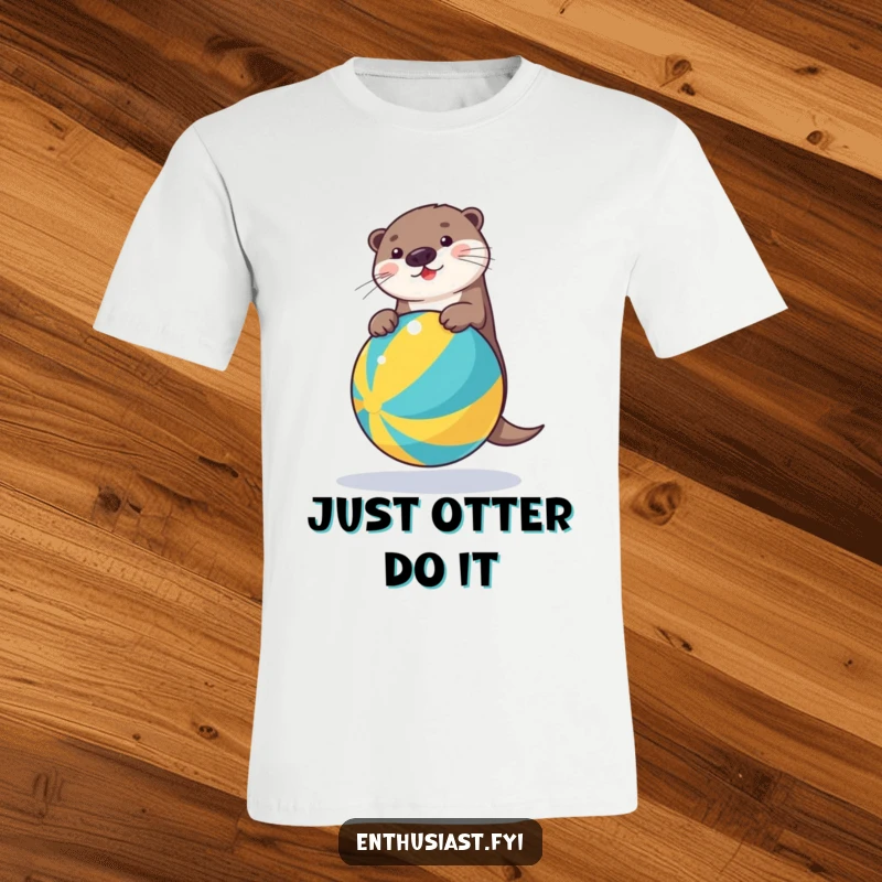 Funny t-shirt showcasing a determined otter expertly balancing on a vibrant beach ball, ready for summer fun and laughs.