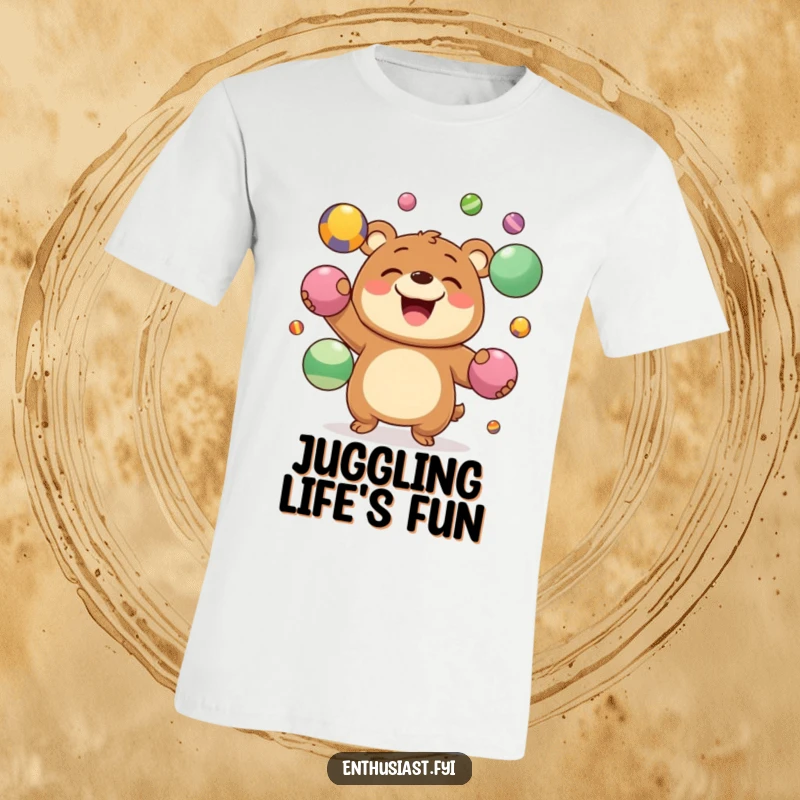 Funny T-Shirt showcasing a grinning bear character expertly juggling multiple vibrant balls, a humorous depiction of skill.