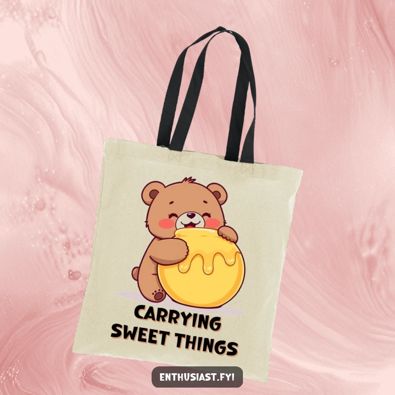 Funny Bear Tote Bag: A happy bear enthusiastically hugs a honey pot, perfect for carrying essentials with sweet style, a funny gift.